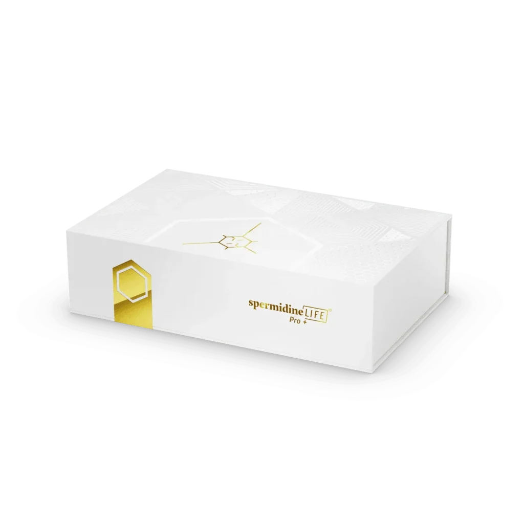 A white rectangular box labeled “spermidineLIFE® Pro+ 4300mg 30-Pack,” adorned with gold geometric accents and showcasing its high-strength 4300mg spermidine content, displayed against a simple light background.